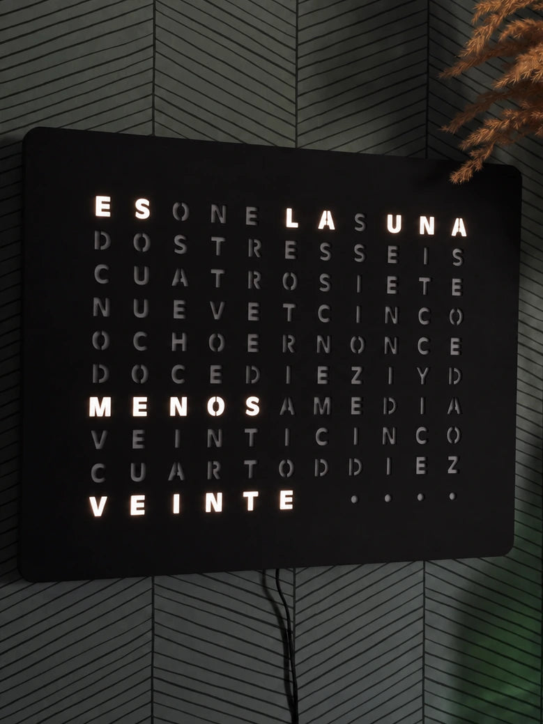 LumosClock Spanish edition wall-mounted against herringbone wallpaper