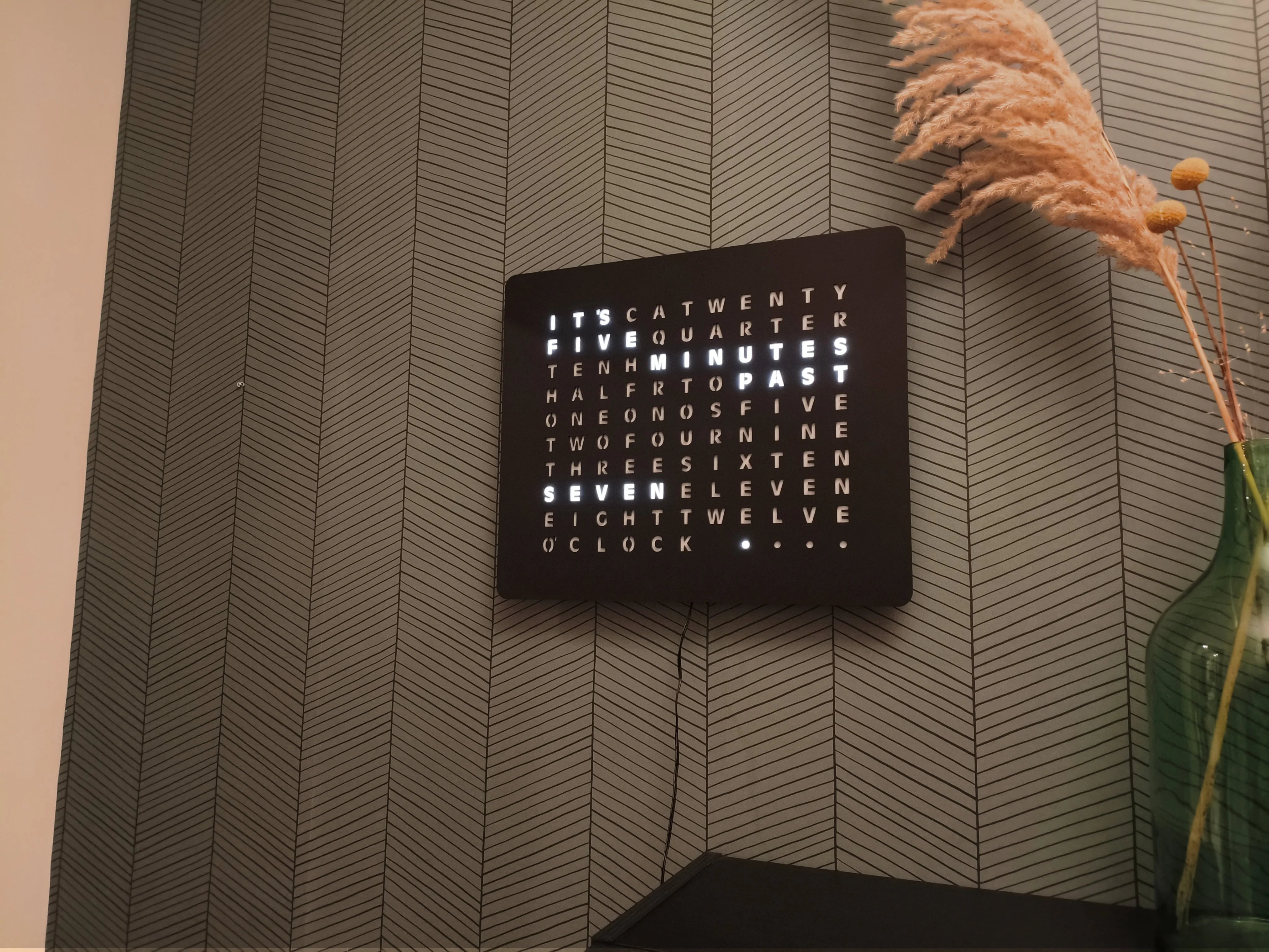 LumosClock on a dark kitchen counter in the evening