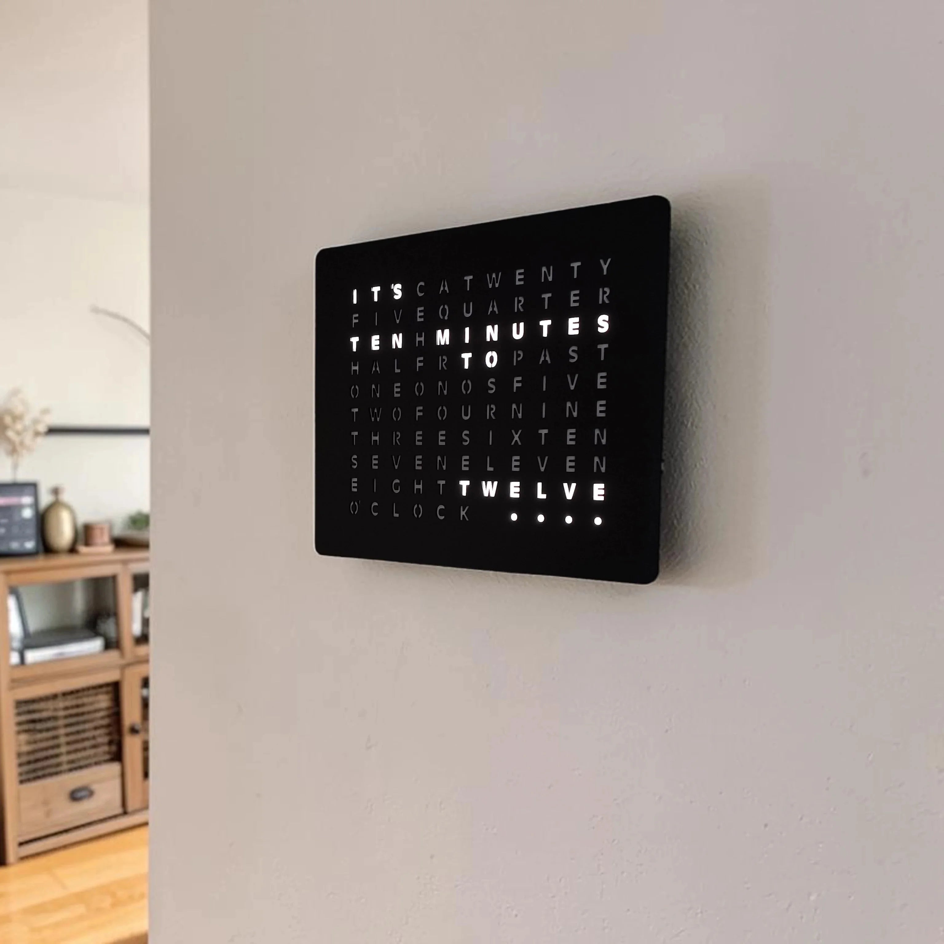 LumosClock mounted on a hallway wall, shown true to scale
